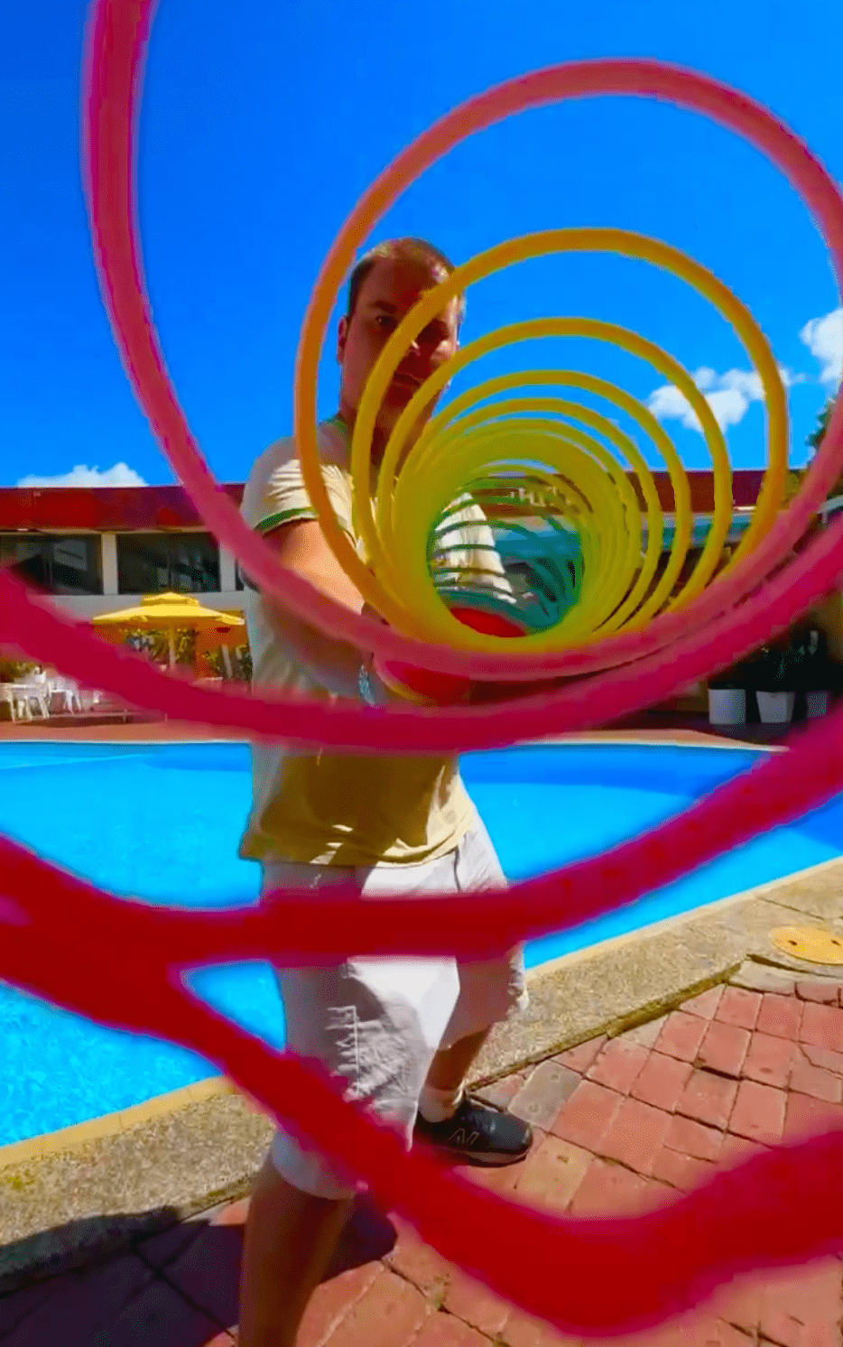 Slinkyfam near pool sunny day slinky tricks booping camera lens