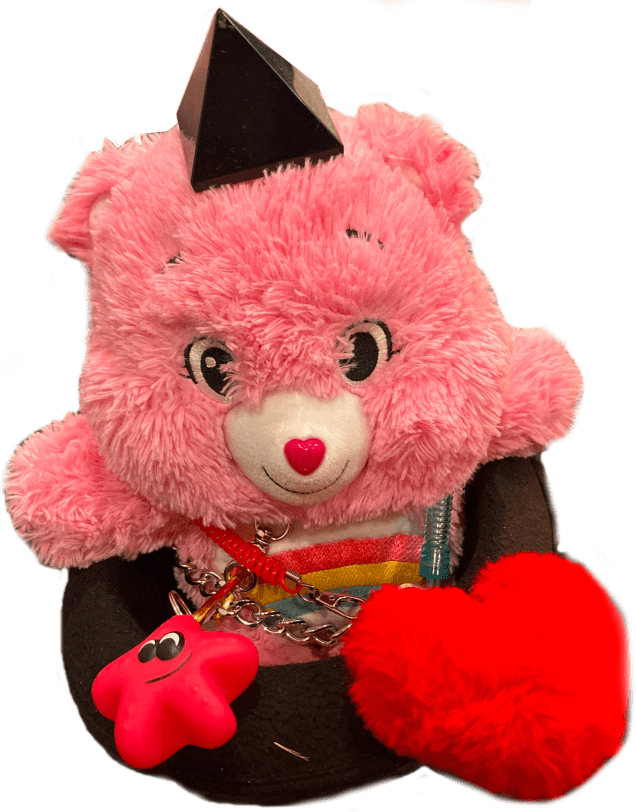 Care Bear Inside Hat Obsidian on head surrounded by love heart and bath toy
